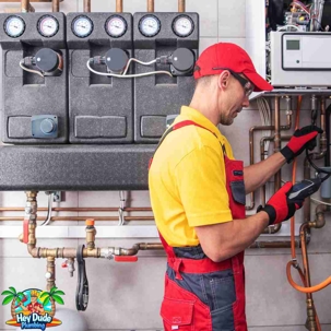 plumber fixing pipes