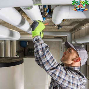 plumber fixing pipes